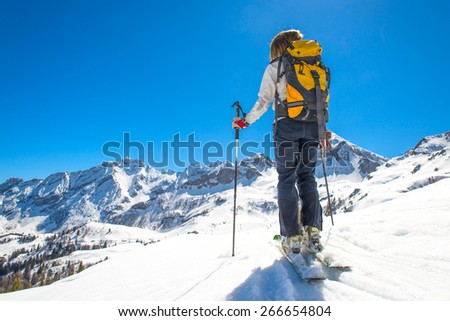 Girl makes ski mountaineering, Randonnee ski trails