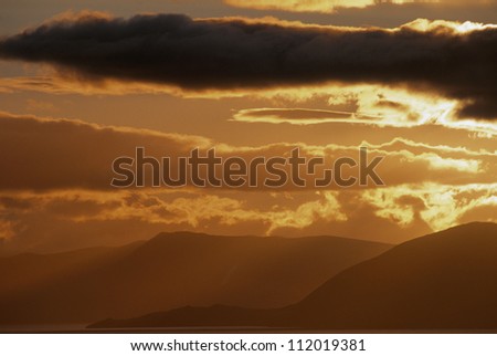 Arctic sunset in coastal mountain landscape, Norway