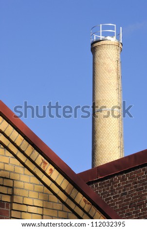 View of factory building with chimney