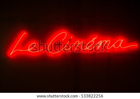 Neon cinema sign in Annecy, France