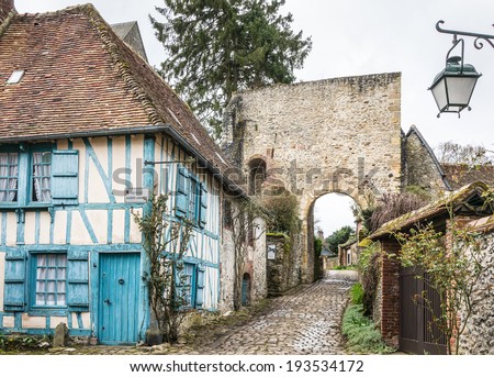 Street with timber frame houses in Gerberoy, Oise, France