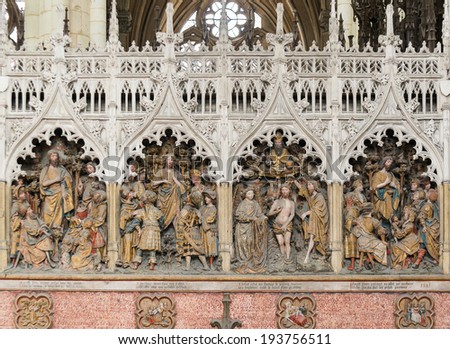 AMIENS, FRANCE - APRIL 22, 2014: Wooden sculptures represents Bible stories in the Notre Dame Cathedral of Amiens, France.