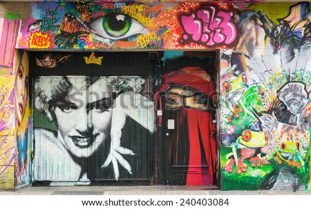 AACHEN, GERMANY - DECEMBER 6, 2014: A door covered by graffiti of Marilyn Monroe\'s portrait. Aachen is a city with population of 260,000 in North Rhine-Westphalia.