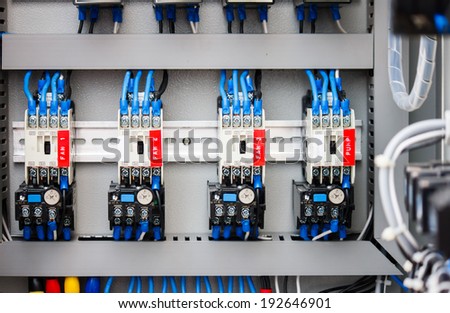 Control panel with wires in industrial workshop