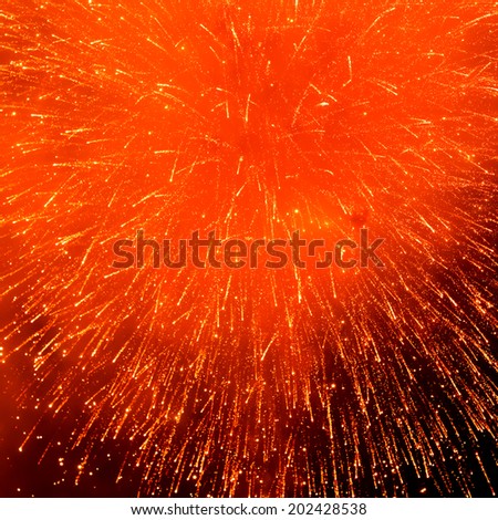 red fireworks against night background for new year celebration