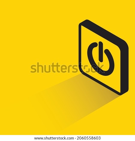 power button with shadow on yellow background