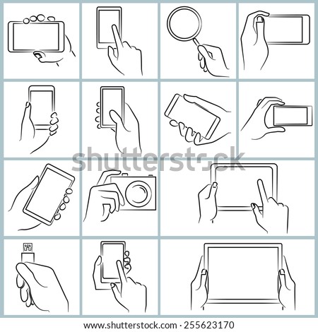 hand hold smartphone and tablet, touching on tablet