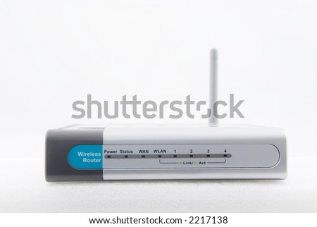 A modern wireless router shot from the front