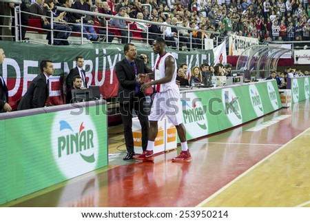 IZMIR - FEBRUARY 15: Pinar Karsiyaka\'s coach UFUK SARICA has tactics to his player in Turkish Basketball League game between Pinar Karsiyaka 92-84 Anadolu Efes on February 15, 2015 in Izmir