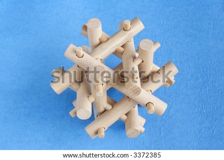 Wood puzzle on a blue background