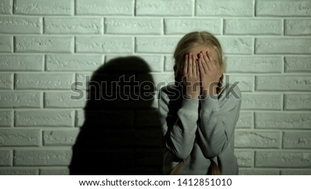 Similar – Image, Stock Photo Little girl covering face with big branch