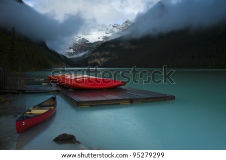 Rental boats on dock at the popular tourist site Lake Louise, Banff National Park (Alberta, Canada)
