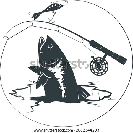 Winter fishing. The fish is chasing the bait. Winter fishing rod with bait and fish