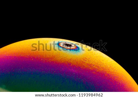 Similar – Image, Stock Photo The half soap bubble is reflected in the wet surface and in this way forms a whole again.