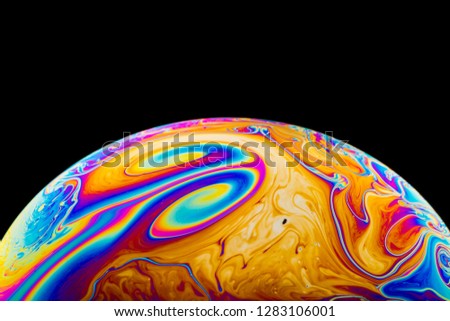 Similar – Image, Stock Photo The half soap bubble is reflected in the wet surface and in this way forms a whole again.