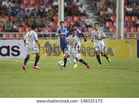 BANGKOK,THAILAND-JULY17:Jetsada (R2) of Singha All-Star in action during the international friendly match Chelsea FC and Singha All-Star at the Rajamangala Stadium on July17,2013 in Thailand.