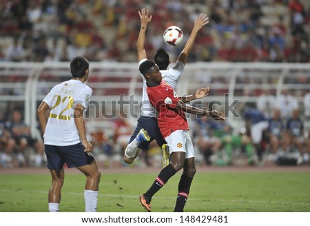 BANGKOK,THAILAND-JULY13:Danny Welbeck(R1) of Manchester United in action during the friendly match between Singha All Star and Manchester United at Rajamangala Stadium on July13,2013 in Thailand.