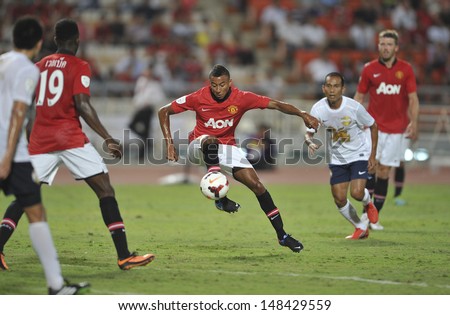 BANGKOK,THAILAND-JULY13:Jesse Lingard(R3) of Manchester United in action during the friendly match between Singha All Star and Manchester United at Rajamangala Stadium on July13,2013 in Thailand.