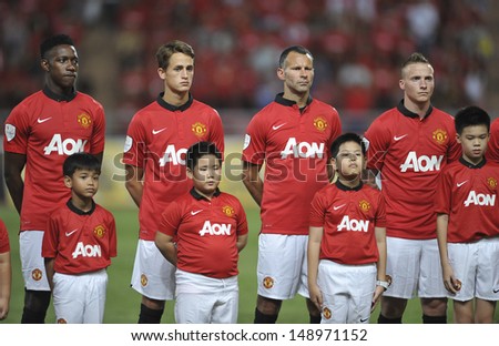 BANGKOK,THAILAND-JULY13: Adnan Januzaj(L2) of Manchester United in action during the friendly match between Singha All Star and Manchester United at Rajamangala Stadium on July 13, 2013 in Thailand.
