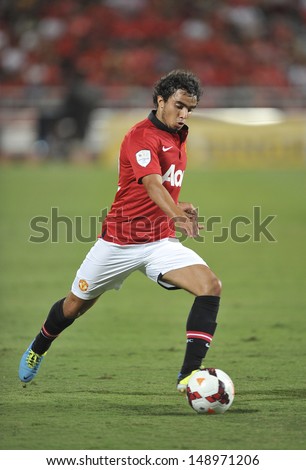 BANGKOK,THAILAND-JULY13: Rafael da Silva of Manchester United in action during the friendly match between Singha All Star and Manchester United at Rajamangala Stadium on July 13, 2013 in Thailand.