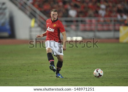 BANGKOK,THAILAND-JULY13: Phil Jones of Manchester United in action during the friendly match between Singha All Star and Manchester United at Rajamangala Stadium on July 13, 2013 in Thailand.