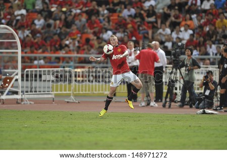 BANGKOK,THAILAND-JULY13: Alex Buttner of Manchester United in action during the friendly match between Singha All Star and Manchester United at Rajamangala Stadium on July 13, 2013 in Thailand.