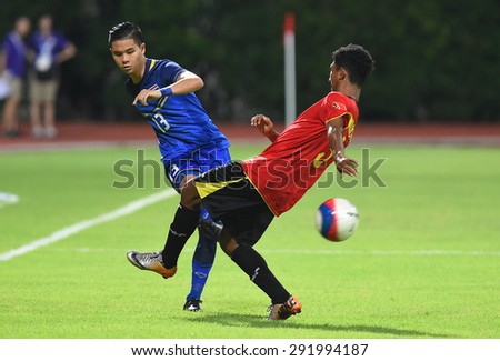 BISHAN,SINGAPORE-JUNE1: Narubadin Weerawatnodom(13) of Thailand in action during the 28th SEA Games Singapore 2015 match between Thailand and Timor Leste at Bishan Stadium on JUNE1 2015 in,SINGAPORE