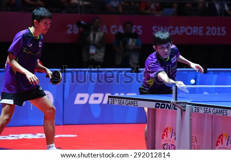 KALLANG,SINGAPORE-JUNE1:Chaisit.C and Nikom.W of Thailand in action during the 28th SEA Games Singapore 2015 between Thailand and Indonesia at Singapore Indoor Stadium on June1 2015 in SINGAPORE.