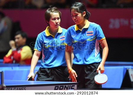 KALLANG,SINGAPORE-JUNE1:Nanthana.K and Suthasini.S of Thailand in action during the 28th SEA Games Singapore 2015 between Thailand and Indonesia at Singapore Indoor Stadium on June1 2015 in SINGAPORE.