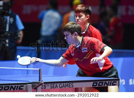 KALLANG,SINGAPORE-JUNE1:Chanakran.U and Padasak.T of Thailand in action during the 28th SEA Games Singapore 2015 between Thailand and Cambodia at Singapore Indoor Stadium on June1 2015 in SINGAPORE.