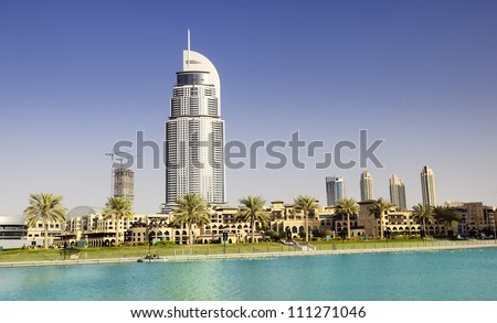 DUBAI, UAE - FEB 02: The Address Hotel in the downtown Dubai area overlooks the famous dancing fountains, taken on February 2, 2012 in Dubai, UAE. The hotel is surrounded by a mall, hotels and Burj Khalifa