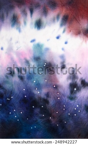 Cosmos filled with stars. Abstract tie dyed fabric background