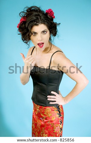 Attractive Woman In Asian Print Skirt Black Corset Top And A Messy Up Do Attractive Woman In Asian Print Skirt Black Corset Top And A Messy Up Do