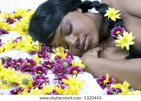 Sleeping beauty in a bed of flowers
