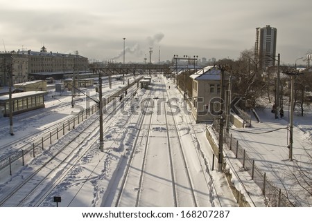 VOLGOGRAD, RUSSIA - DECEMBER 12: cleaning snow from the railway tracks Central station. December 12, 2013 in Volgograd, Russia.