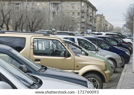 VOLGOGRAD, RUSSIA - JANUARY 17: The problem of absence of underground Parking lots - one of the bands on the road always busy. January 17, 2014 in Volgograd