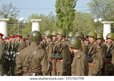 VOLGOGRAD - MAY 9:Soldiers in uniform of the Soviet army are preparing for the solemn exit to the parade in honor of the victory in the great Patriotic war.  May 9, 2014 in Volgograd, Russia.