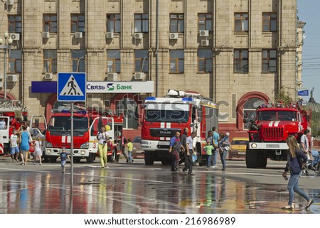 VOLGOGRAD - SEPTEMBER 6: Fire engines at the exhibition stand under the open sky on the forecourt of Volgograd.. September 6, 2014 in Volgograd, Russia.