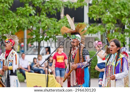 VOLGOGRAD - JUNE 20: The Indians of South America play ethnic music and sing folk songs on the area of the Russian city. June 20, 2014 in Volgograd, Russia.