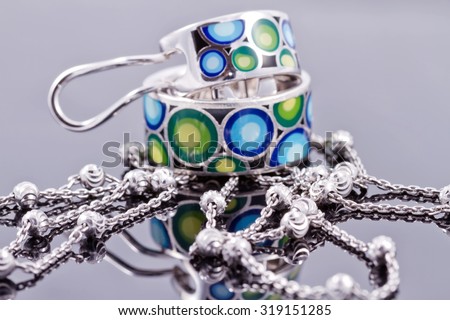 engagement silver ring with precious stones and fine silver chain