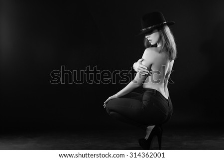 black and white photo sexy girls brunettes in erotic clothing on a black background