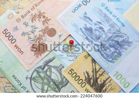 South Korean Won currency with pin on Seoul