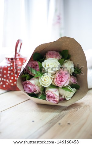 Bouquet of flowers in paper packaging