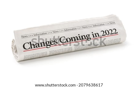 Rolled newspaper with the headline Changes coming in 2022 ストックフォト © 