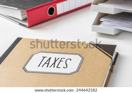 A folder with the label Taxes