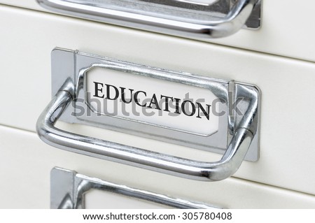 A drawer cabinet with the label Education