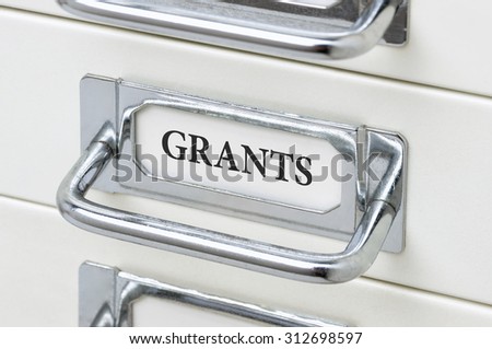 A drawer cabinet with the label Grants