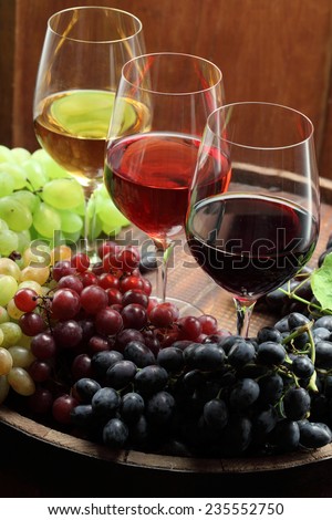 Red wine glass, rose wine glass, white wine glass, red wine grapes, white wine grapes, wine barrel