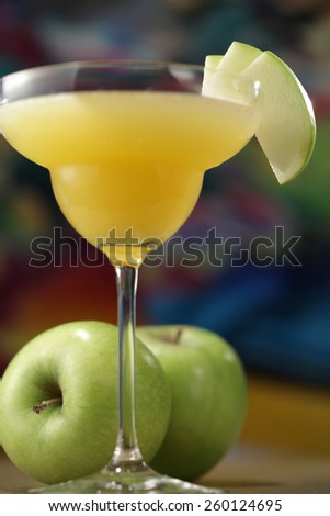 Glass of apple juice/ apple martini glass and green apples Granny Smith