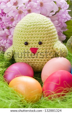 handmade chick with flowers and easter eggs